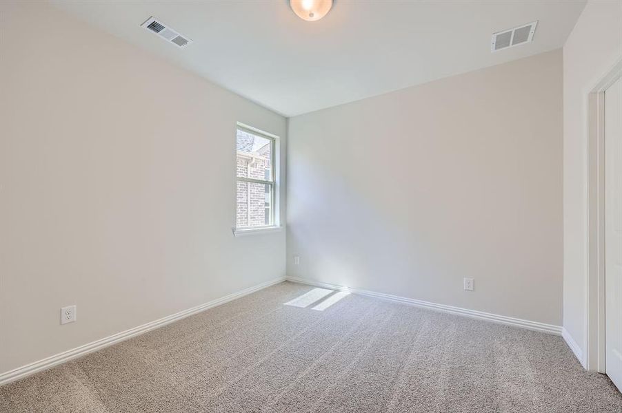 Bedroom with carpet