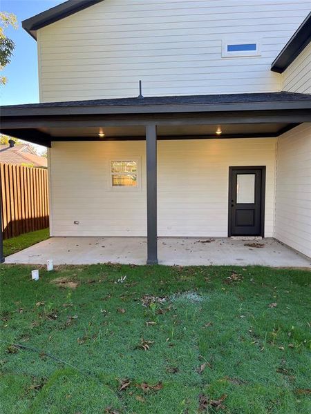 Garage featuring a yard