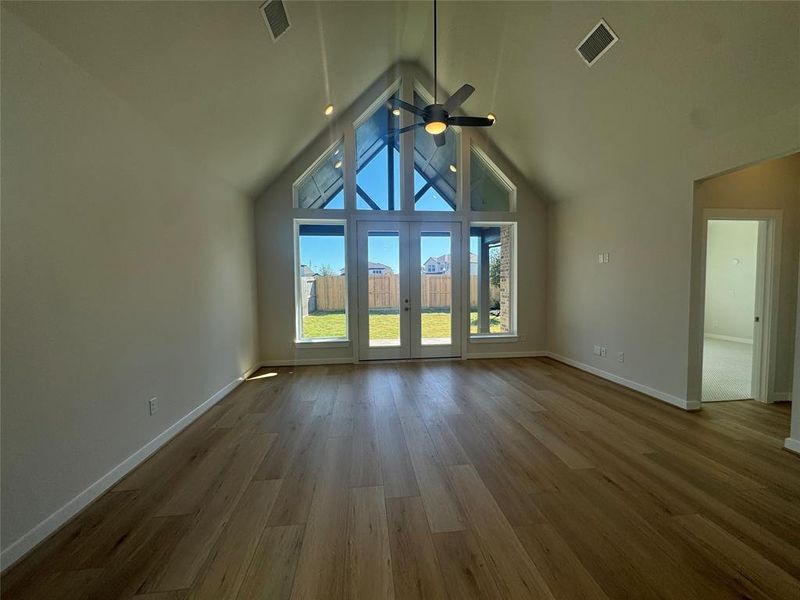 Home includes high ceilings in the family room and a double 8' door entrance to the huge back covered patio.