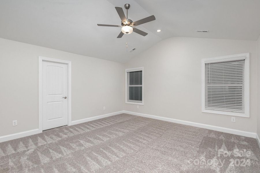 Primary Bedroom with Vaulted Ceiling