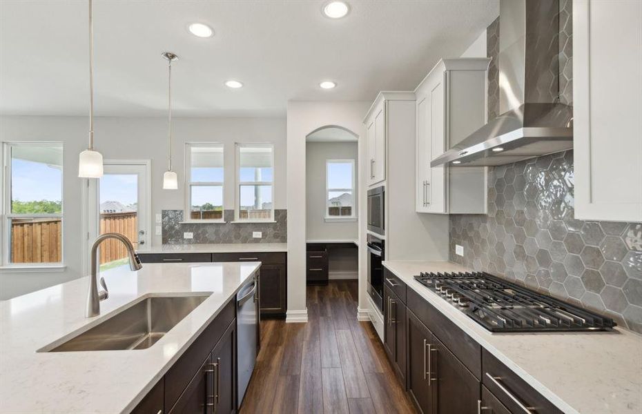 Ample cabinet space in kitchen *real home pictured