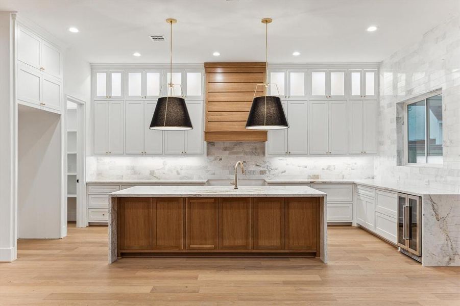 Large island is centerpiece of this magnificent chef's kitchen