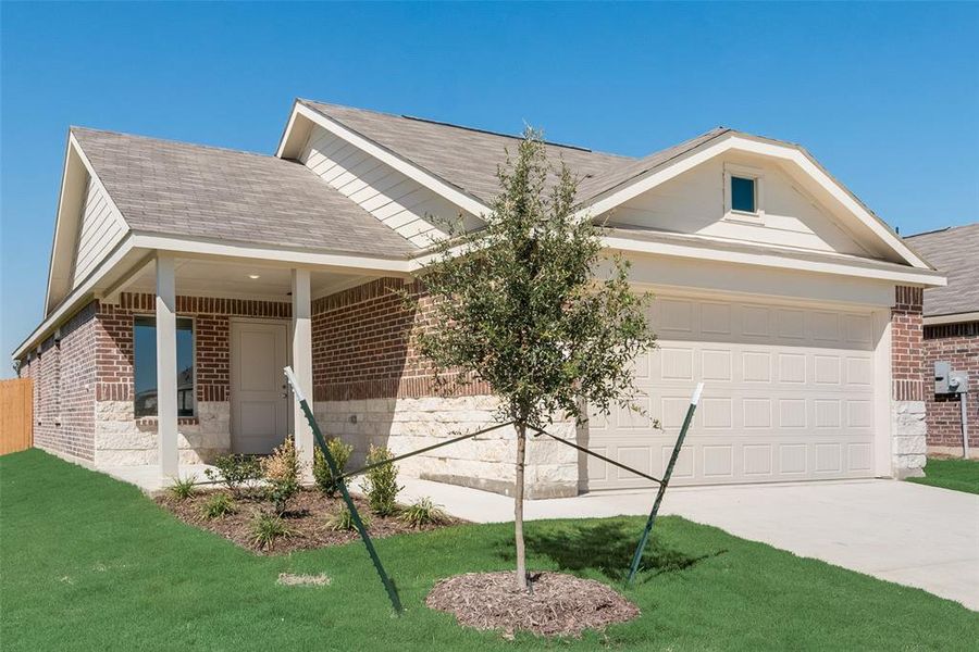 Single story home with a front yard and a garage