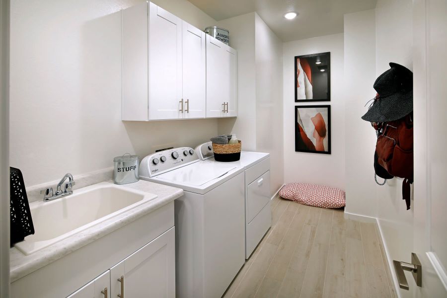 The large laundry rooms offers plenty of additional storage space.