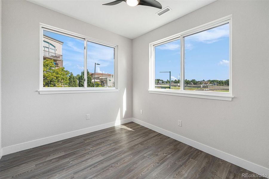 Sample primary bedroom.  All bedrooms have ceiling fans.