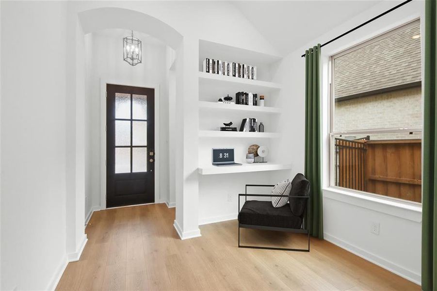 Lifestyle room with built- in shelves.