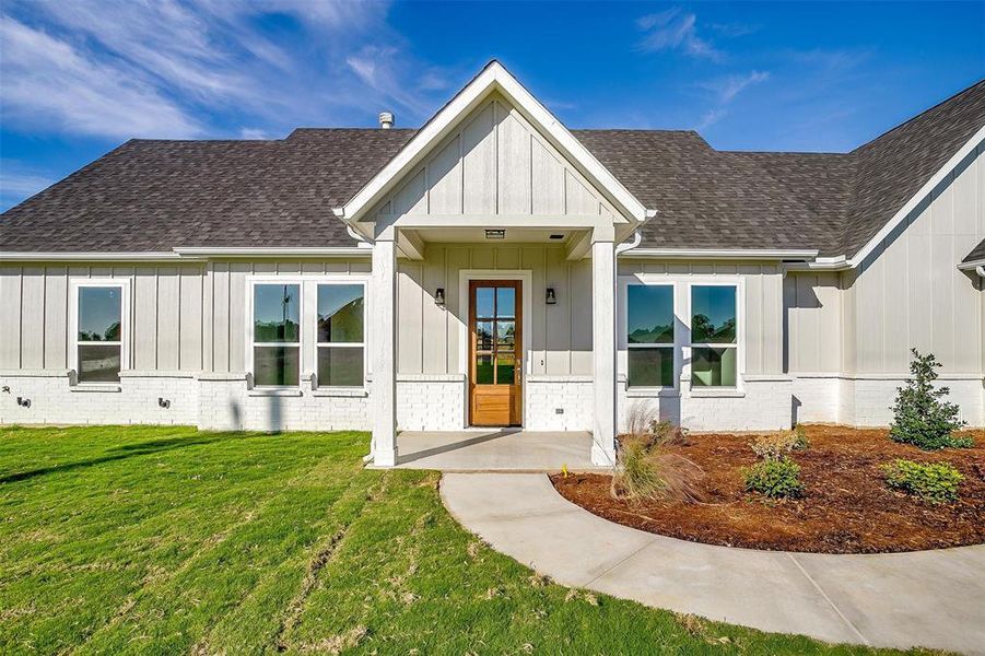 View of front of home with a front lawn