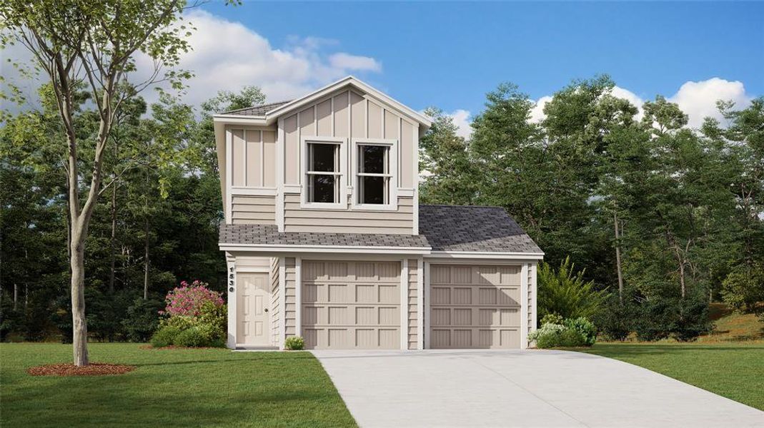 View of front of house featuring a garage and a front yard