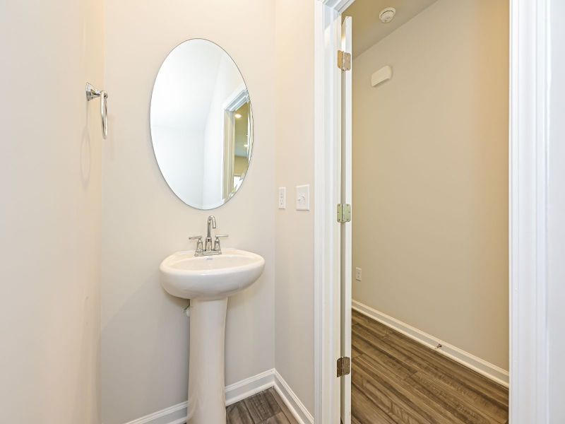 The convenient powder room is located off the great room.
