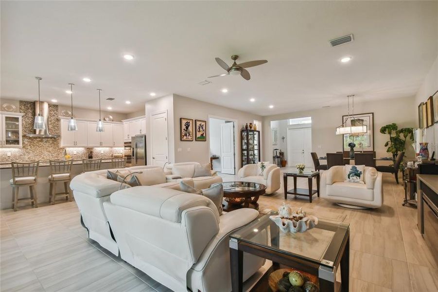 Currently used as a family room/dining room combination, this open floorplan is an extremely flexible / changeable living space.