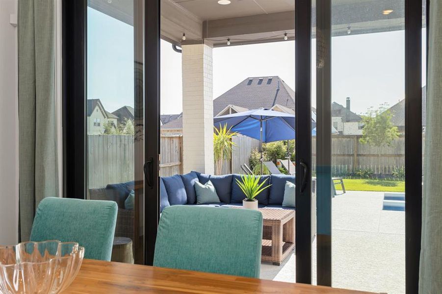 Get ready to enjoy your own backyard oasis. The backyard offers the convenience of a covered patio, a cooling deck to keep your feet from burning, and a saltwater pool with a hot tub attached.