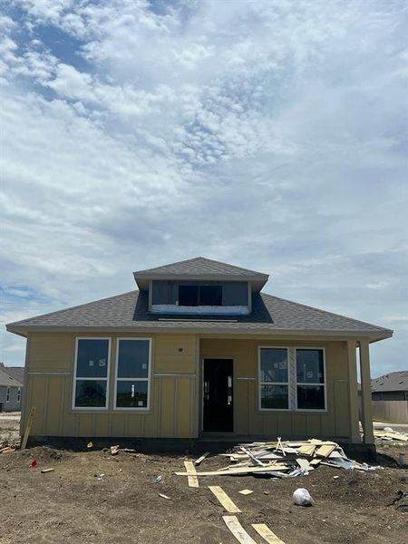 Photo of actual home, under construction.