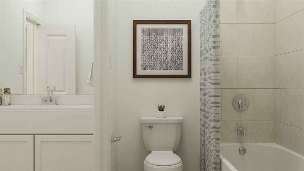 Full bathroom with toilet, vanity, and shower / tub combo