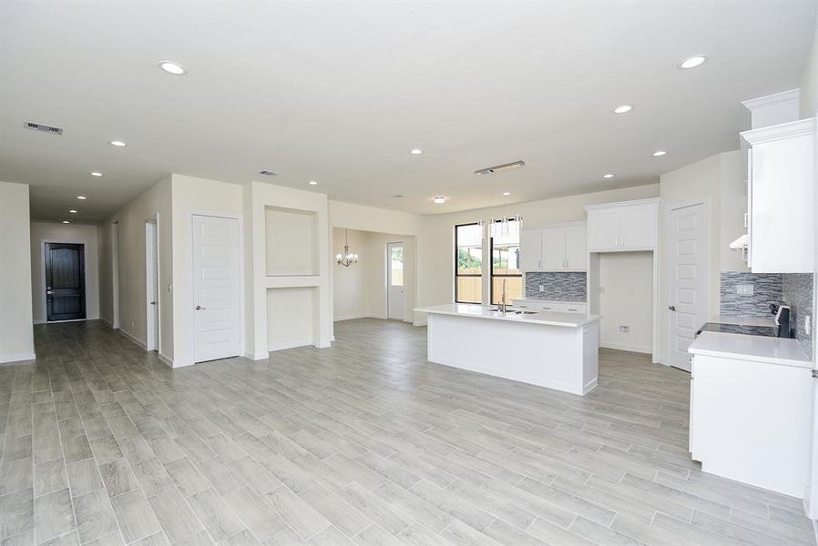 Open concept living, kitchen, and dining area—a perfect open floor plan for your everyday living!