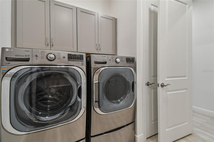 Laundry with built in cabinetry