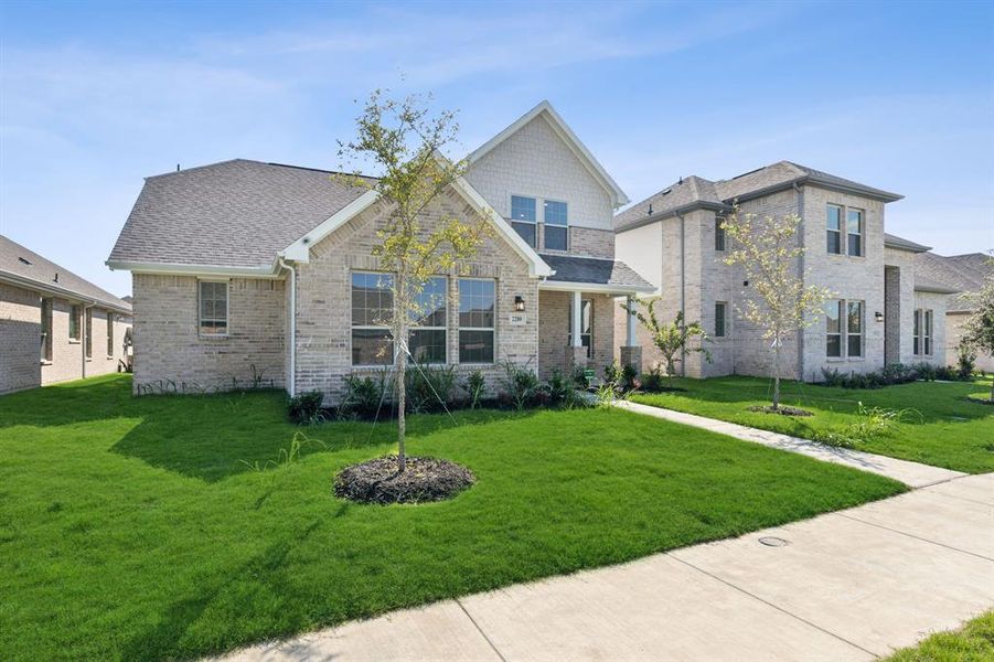 View of front of home featuring a front lawn