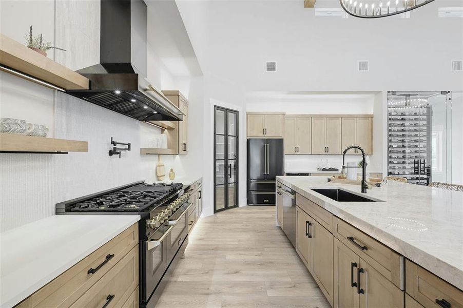 Beautiful custom cabinetry, large kitchen island with waterfall sides.