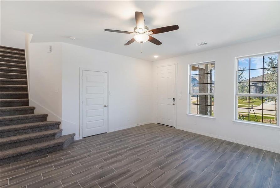 Upgraded ceramic woodstyle flooring throughout the kitchen and living space.