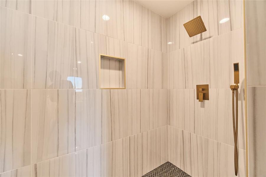 Bathroom featuring a shower and elevator