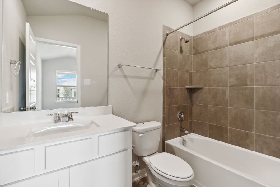 Guest bathroom in the Hughes floorplan at a Meritage Homes community.