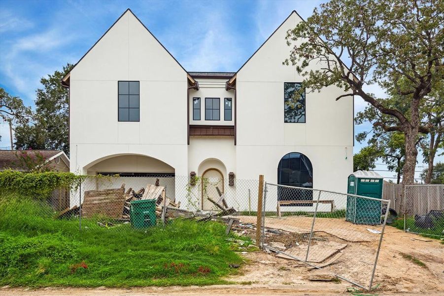 A truly stunning elevation. 12 foot ceilings on the first floor. Double wide driveway coming soon.  Photo as of 9/3/2024