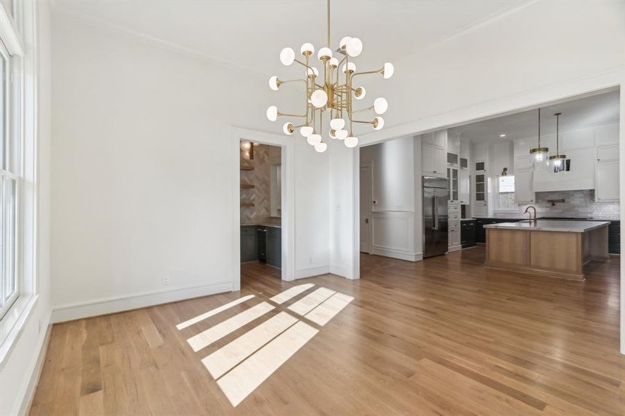 The dining room in 8855 Cardwell is in a truly wonderful space, close to the kitchen and the wine room and not secluded up in the front of the home.