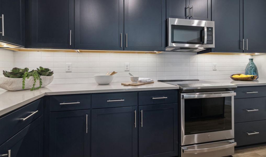 White subway tile backsplash in kitchen