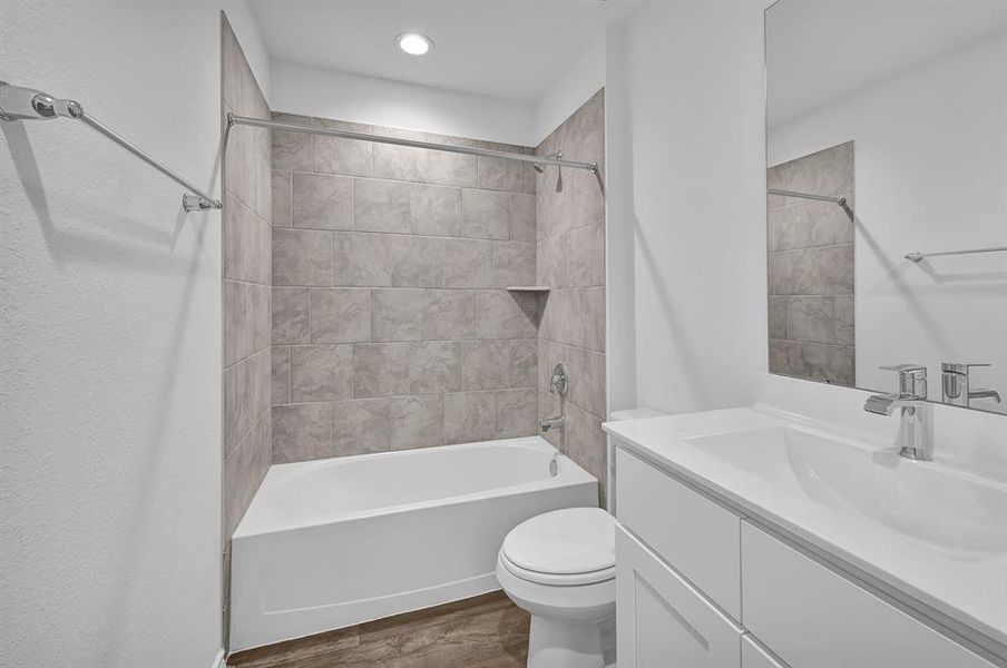 Upgraded Light Shaker Vanity with Gorgeous Quartz Vanity Countertops, Deep Undermount Sink, Vinyl Wood Floors! Tub and Shower Combination! All of our Commodes are the Elongated Large Ones throughout our homes! **Image Representative of Plan Only and May Vary as Built**