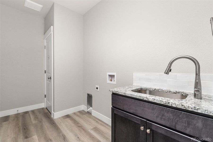 Main floor laundry with closet