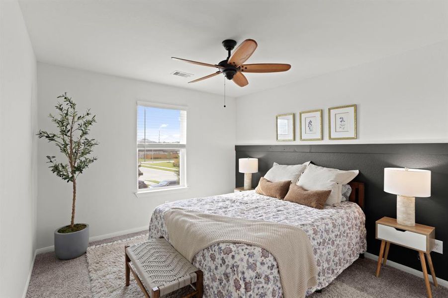 Discover the comfort of this inviting upstairs guest bedroom, boasting elegant paint choices and generous space. Experience the convenience of ample closet storage in a serene, well-appointed retreat.