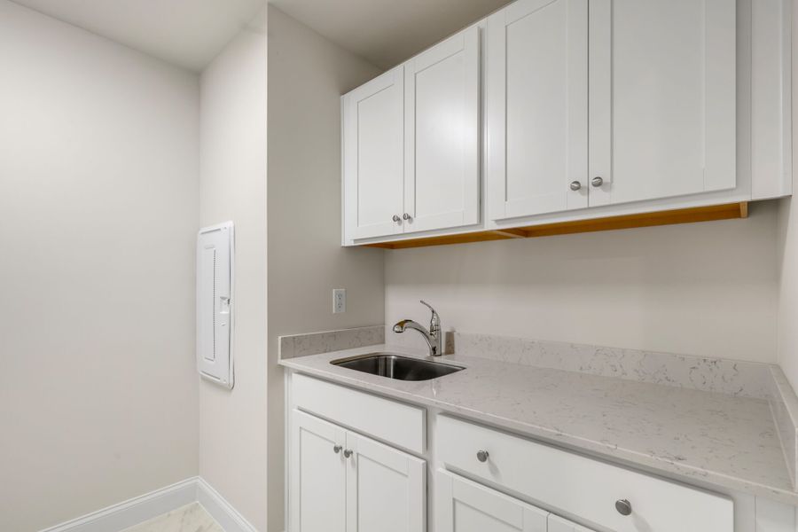 Laundry - shown with optional cabinets and laundry sink