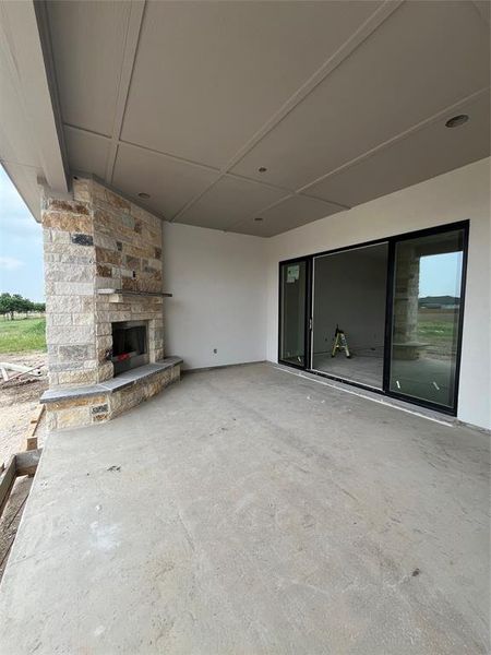 Extended patio with gas fireplace.