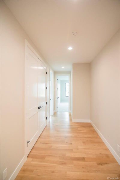 Spacious hallway with linen closet