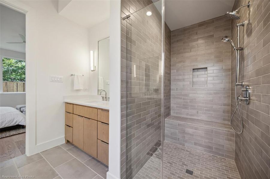 Primary bathroom with separate standing shower on 1st level