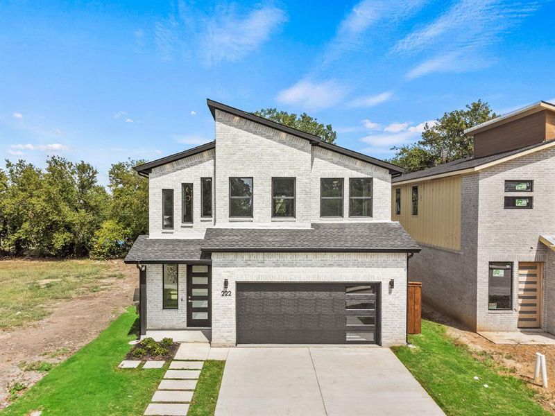 Modern home featuring a garage