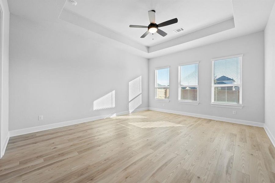 Master bedroom is downstairs with stunning vinyl flooring.