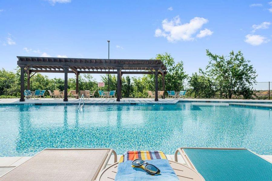 View of swimming pool featuring a pergola