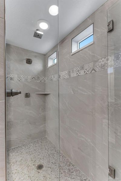 Large walk-in shower with a rain shower head!