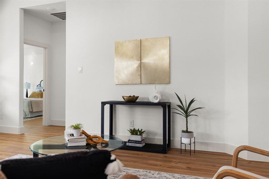 Living room with wood-type flooring