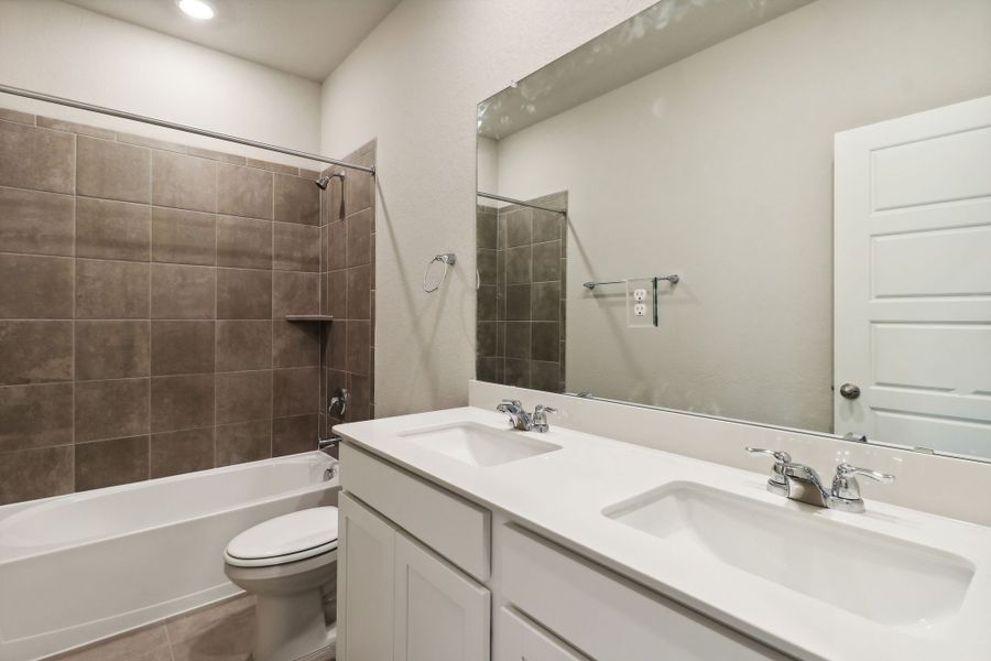 Guest bathroom in the Hughes floorplan at a Meritage Homes community.