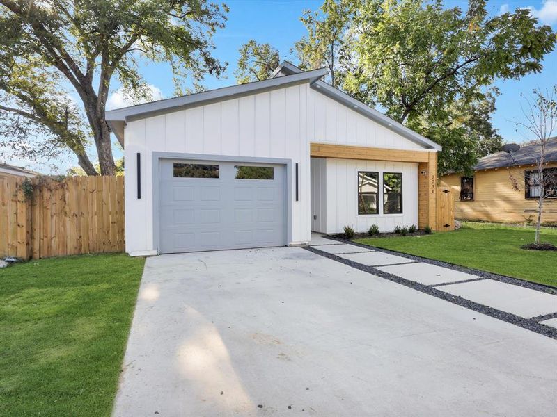 View of front of house with a front lawn