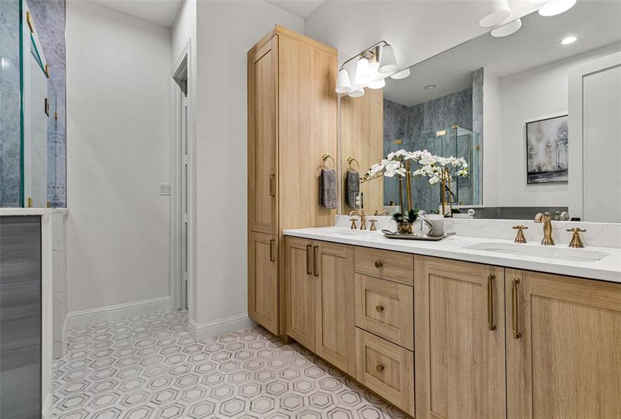 Bathroom with vanity and an enclosed shower