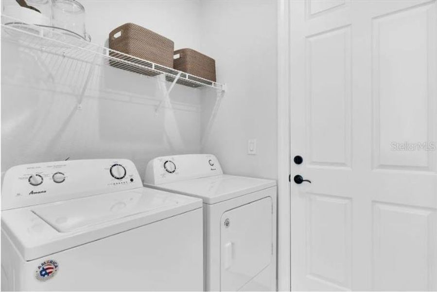 Laundry Room. Model home design. Pictures are for illustration purposes only. Elevations, colors and options may vary. Furniture is for model home only.