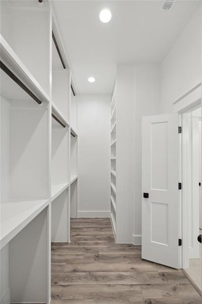 Custom closet in the primary bedroom / bathroom area