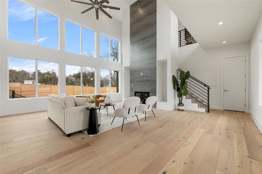 Entry way to soaring high ceilings and fireplace in the living area!