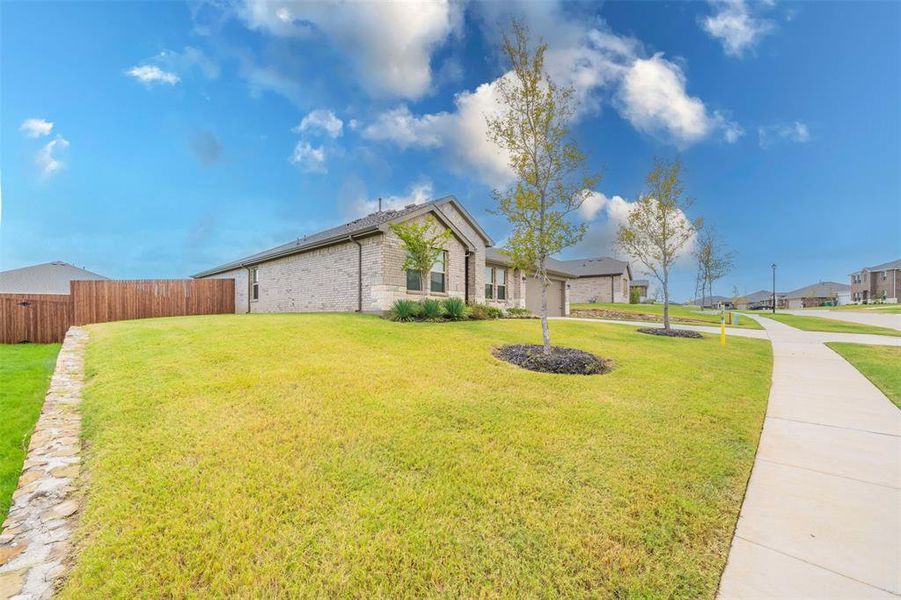 View of front of property featuring a front yard