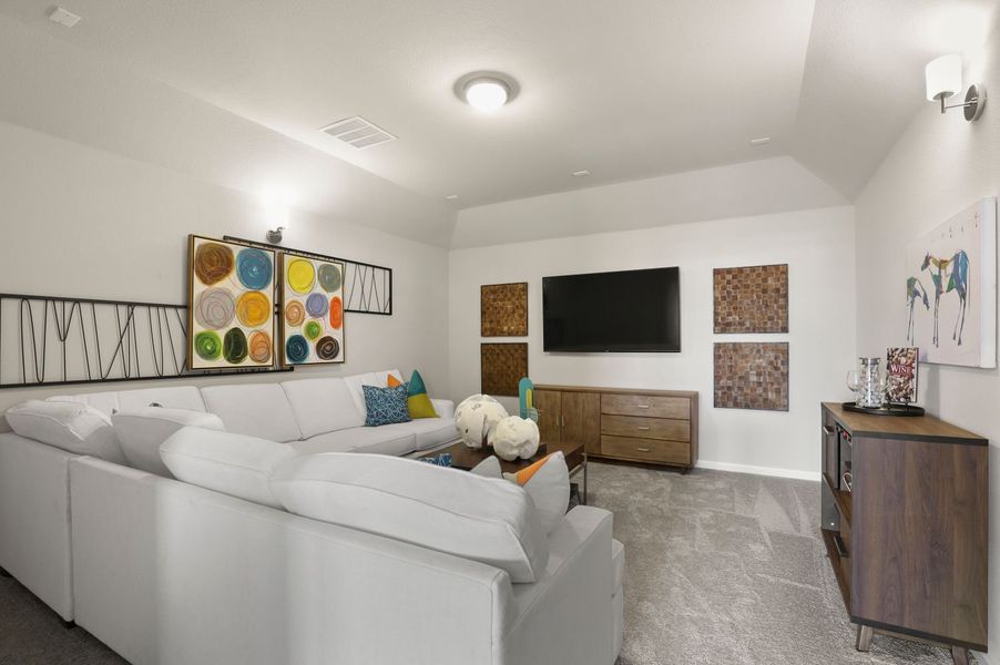 Media room in the Masters home plan by Trophy Signature Homes – REPRESENTATIVE PHOTO