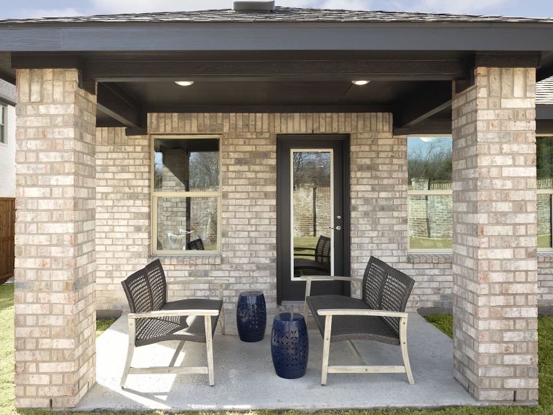 Enjoy the outdoors on the back patio of the Preston