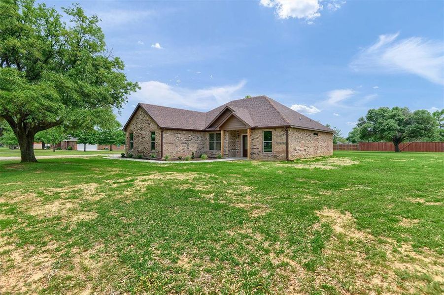 View of front of home with a front yard