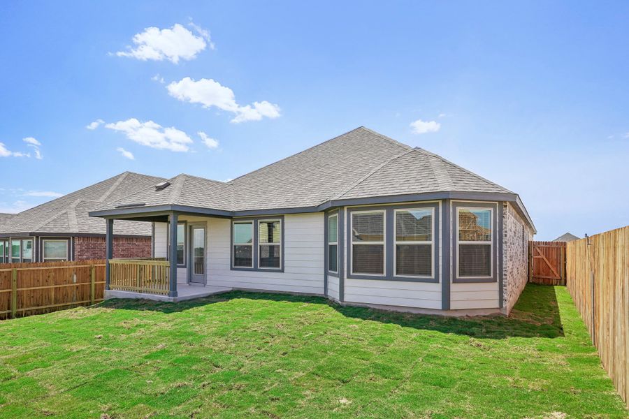 Back exterior of the Fitzhugh floorplan at a Meritage Homes community.